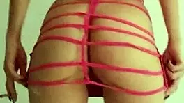 being a slut in bright pink dress, stripping and spanking my narrow ass?