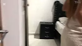 Colombian friend performs striptease with clothes ripped outdoors.