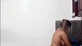 this tall curvy latina is cooking naked in the kitchen looking submissive and cute