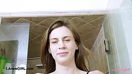 can a shy elegant model turn sensual in a steamy bath photoshoot on the sofa?