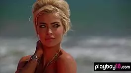 Lisa Seiffert poses naked outdoors with ripped clothes.