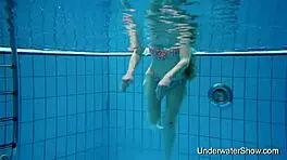 Sexy young girl reveals stunning body in underwater display