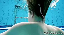 Sexy young girl reveals stunning body in underwater display