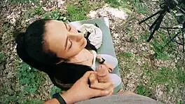 pov backstage jerking on ponytail brunette while she meditates in nature.