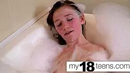 babe masturbates in bath with close-up orgasm