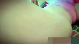 Busty stepmother masturbates at home.