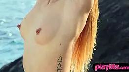 i’m a petite spanish milf stripping bare on the beach for all to see