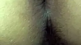 Beautiful Indian girl experiences intense anal sex with boyfriend in bedroom. Screaming echoes through homemade video.