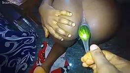 This young girl is training her ass to take a massive black cock.