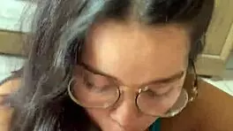 Nerdy brunette with natural tits and brown eyes gives deep blowjob to Wellington Prado's big cock in jeans shorts