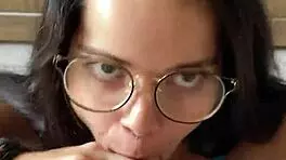 Nerdy brunette with natural tits and brown eyes gives deep blowjob to Wellington Prado's big cock in jeans shorts