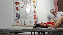 Gynecologist Examines Patient in Hospital Setting