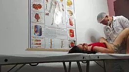 Gynecologist Examines Patient in Hospital Setting