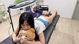 cute girl teases tattoo artist into steamy doggystyle fun