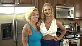 blonde babe dreams of licking her stepmom's pussy in a hot kitchen lesbian fuck