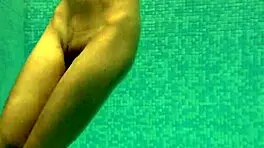 Irina Russaka Bathes Underwater In Pool, Showing Small Tits.
