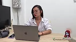 Young Latina Works In Office Using Toys While Chatting With Girlfriend