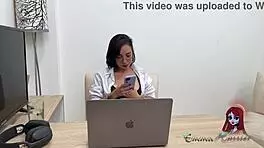 Young Latina Works In Office Using Toys While Chatting With Girlfriend
