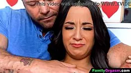 Big stepdad cuddles ill stepdaughter on bed