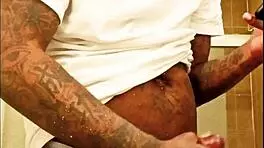 youngstarbrazy is warming up for new content, showing off her tattoo and monster cock