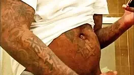 youngstarbrazy is warming up for new content, showing off her tattoo and monster cock