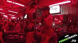 Horny petite 18+ brunette shakes ass at bar in sneakers for group swingers