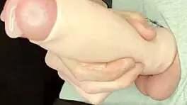 Robbystrokes shows foreskin extender with huge cumshot on teen 18+ cage play.