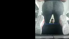 Skinny Mexican teen bent over in leggings at the gym