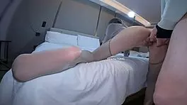 asian girl with small waist and long legs gets foot fetish attention from husband