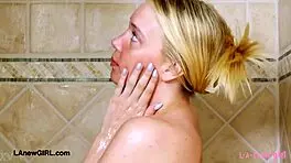 Teen Blonde Model Strips Down for a Steamy Shower in Solo Action.