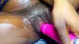 I watch this sexy afrocentric stripper rip her clothes and ride my dick.