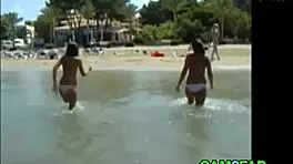 teens show off great tits on the beach