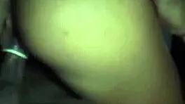 Arab soldier fingers booty outside military base