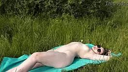 yo, this cute brunette babe strips naked on a wild public beach!