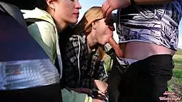 Outdoor Double Blowjob in Car Trunk with Blonde Amateurs