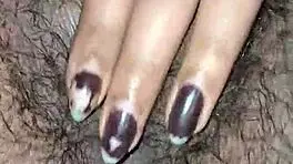 Desi housewife moans loud during close-up hairy pussy worship. Tight Asian solo action!