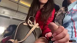 Risky jerking off on a crowded plane. Public dick flashing gets wild.