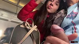 Risky jerking off on a crowded plane. Public dick flashing gets wild.