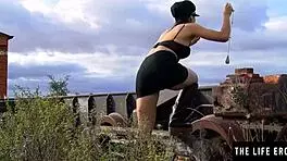 adventurous beauty masturbates in abandoned railroad car, horny in leather