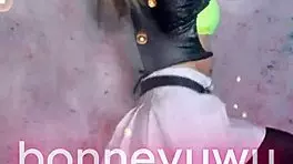 Bonneyuwu dances in white skirt with pigtails in Argentina