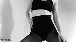 Fishnet-clad ass teases feet in black and white!