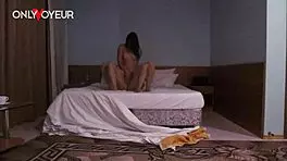 Homemade voyeur captures passionate after-party hotel fuck, horny chick moaning in cowgirl position.