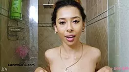 adorable brunette beauty enjoys a relaxing shower in the casting session