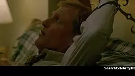 alexandra daddario strips naked on the sofa, gets handcuffed in bondage scene.