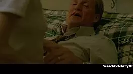 alexandra daddario strips naked on the sofa, gets handcuffed in bondage scene.