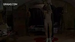 skinny brunette experiences kinky slaps in bdsm play.