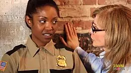 Why is Nina Hartley’s police chief role in this lesbian threesome so wild?