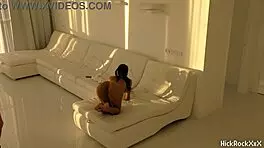 The black asian teen rides the red cock in the white room.