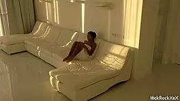 The black asian teen rides the red cock in the white room.