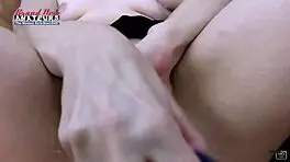 petite brunette cora plays with toys and licks a treat